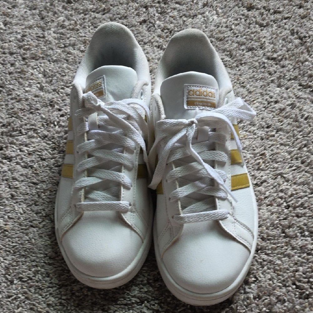 Adidas Women's White Sneakers with Gold Stripes